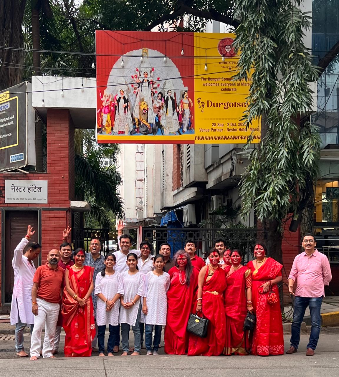 Community members gathered outside during Pujo 2025